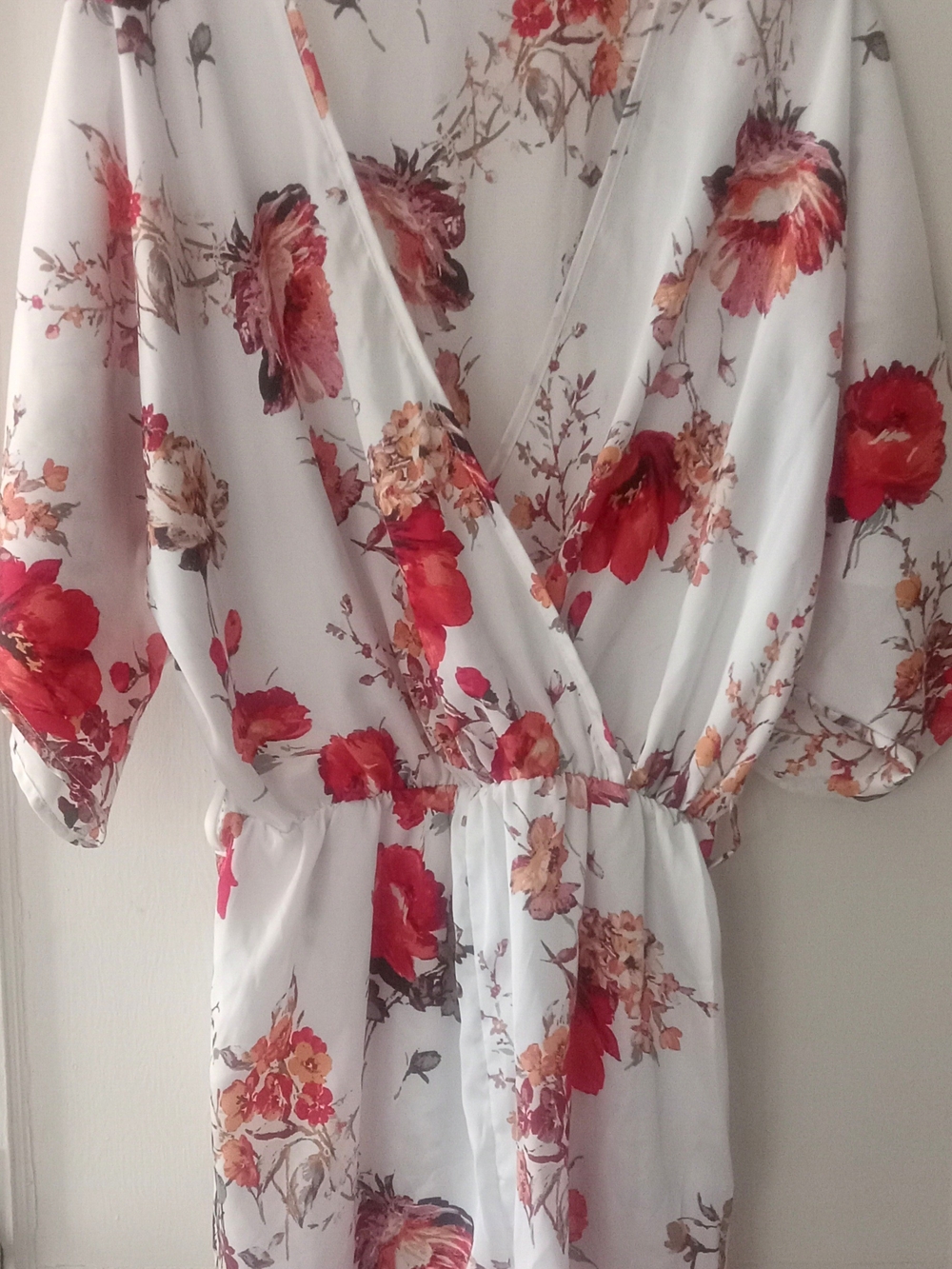 White Floral Surplice Waist Romper with Red & Peach Blooms